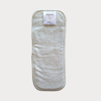 The loose bamboo terry booster included with the newborn nappy.