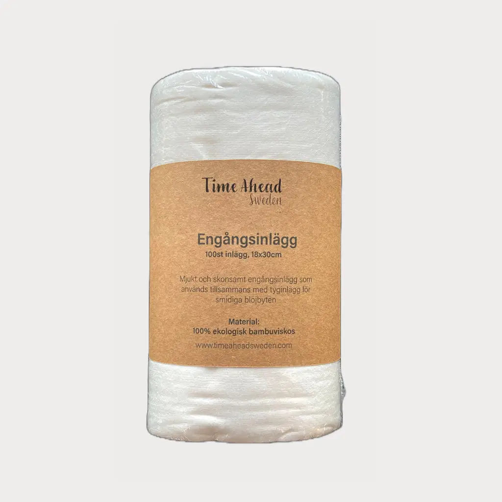Engångsblöjinsats med miljövänlig förpackningsetikett.