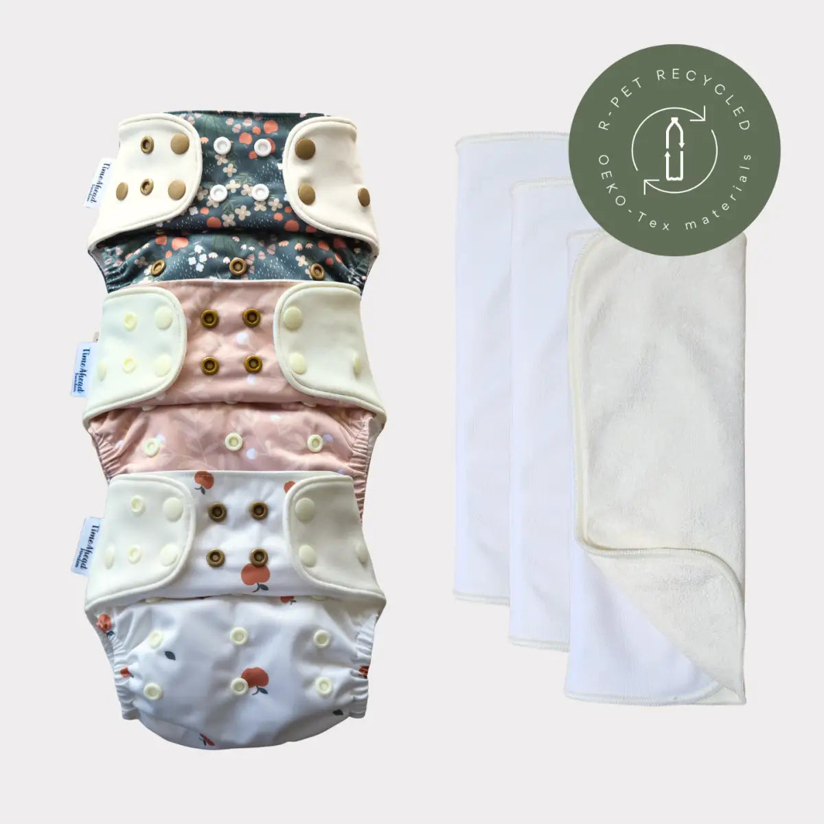 Startpaket komfort allt-i-ett blöja i blommiga och enfärgade mönster med snap closures för barnets hud i medvetet val av återvunnet material