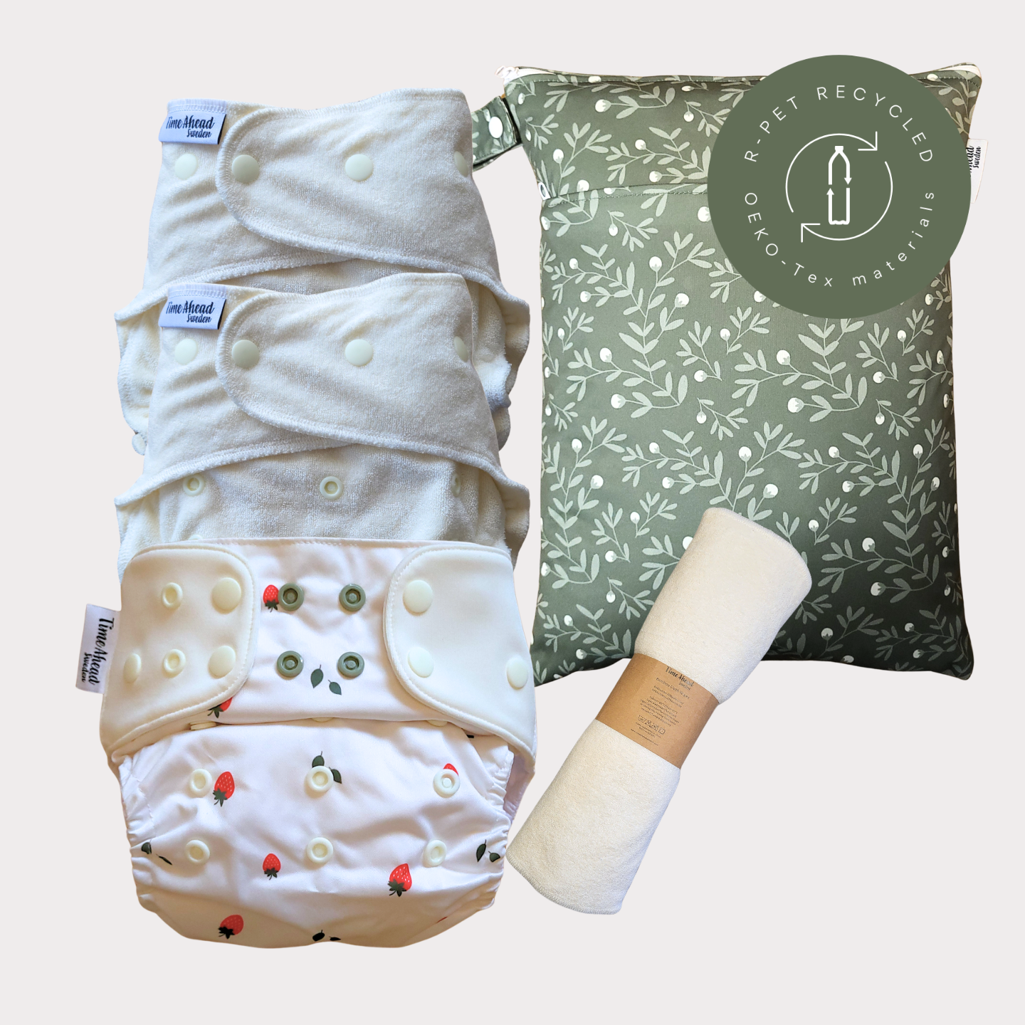 Startpaket nattblöja Smultron med tillbehör: 2 nattblöjor, blöjskal 5–17 kg, wetbag Humleblomster grön + tvättlappar, r-PET, OEKO-Tex.