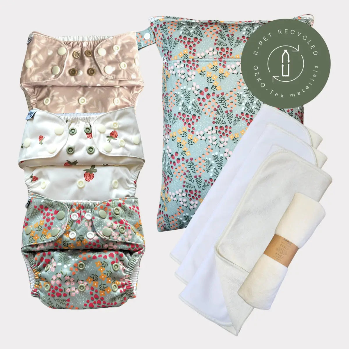 Startpaket slim med tre blomstertryckta mjuka bambufrotté blöjskal i pastell med knappstängning och matchande förvaringsväska för barnets hud